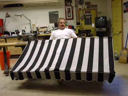 Russ holding 72" awning